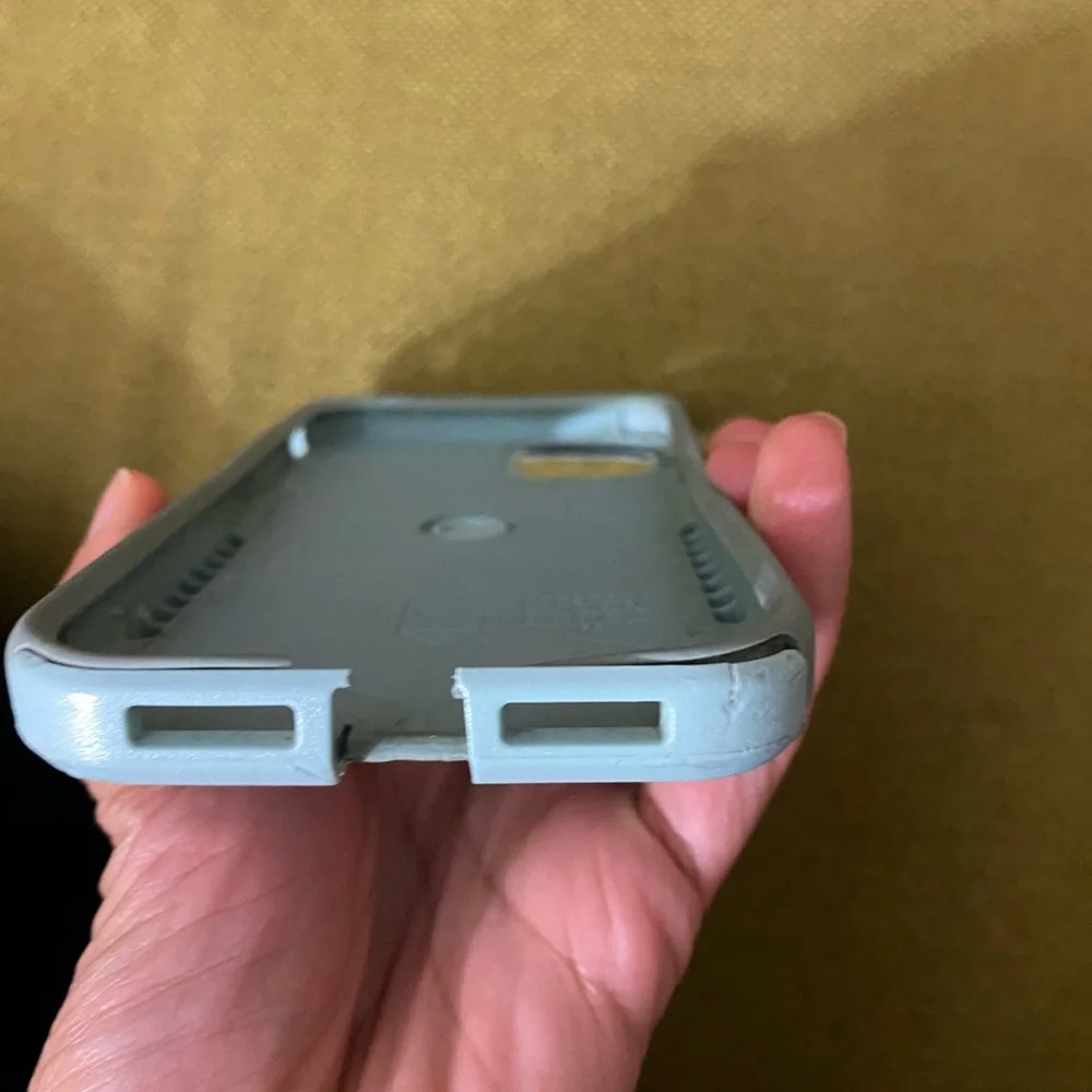 Slightly damaged otter box symmetry case iPhone 11